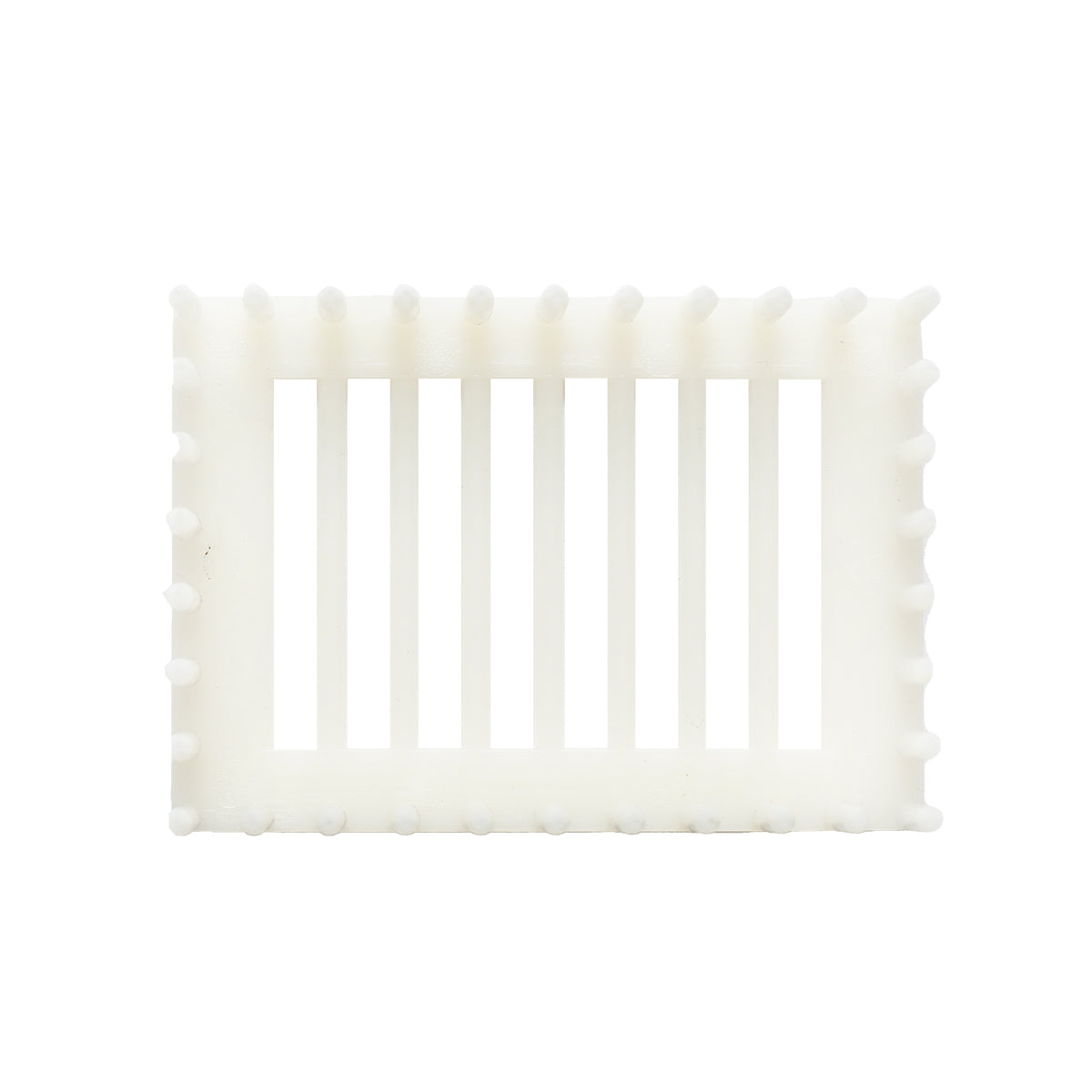 Queen bee isolator on a plastic comb with pins