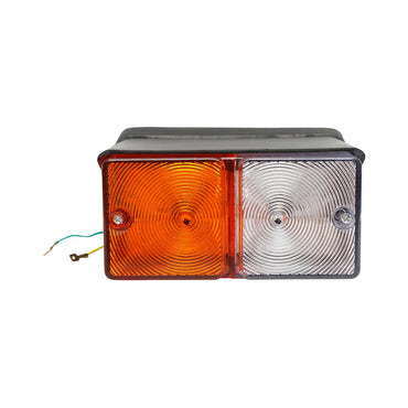 Left front signal and position lamp for Ford tractor