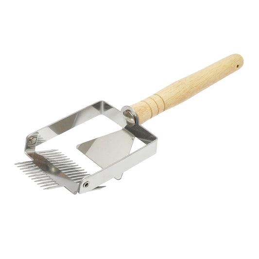 Fork uncapped, honey decapper made of stainless steel with a wooden handle.