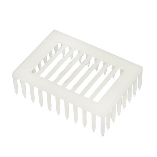 Queen bee isolator on a plastic comb with pins