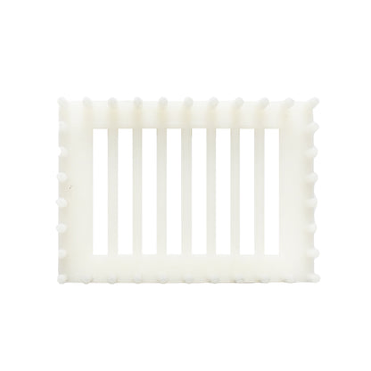 Queen bee isolator on a plastic comb with pins
