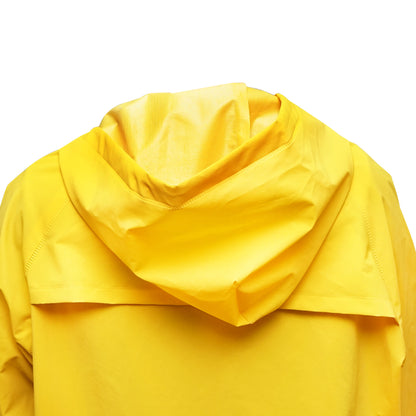 Waterproof XXXL poncho with hood made of polyester and PVC, featuring ventilation slots, 2 pockets, and a yellow zipper by Breckner Germany.